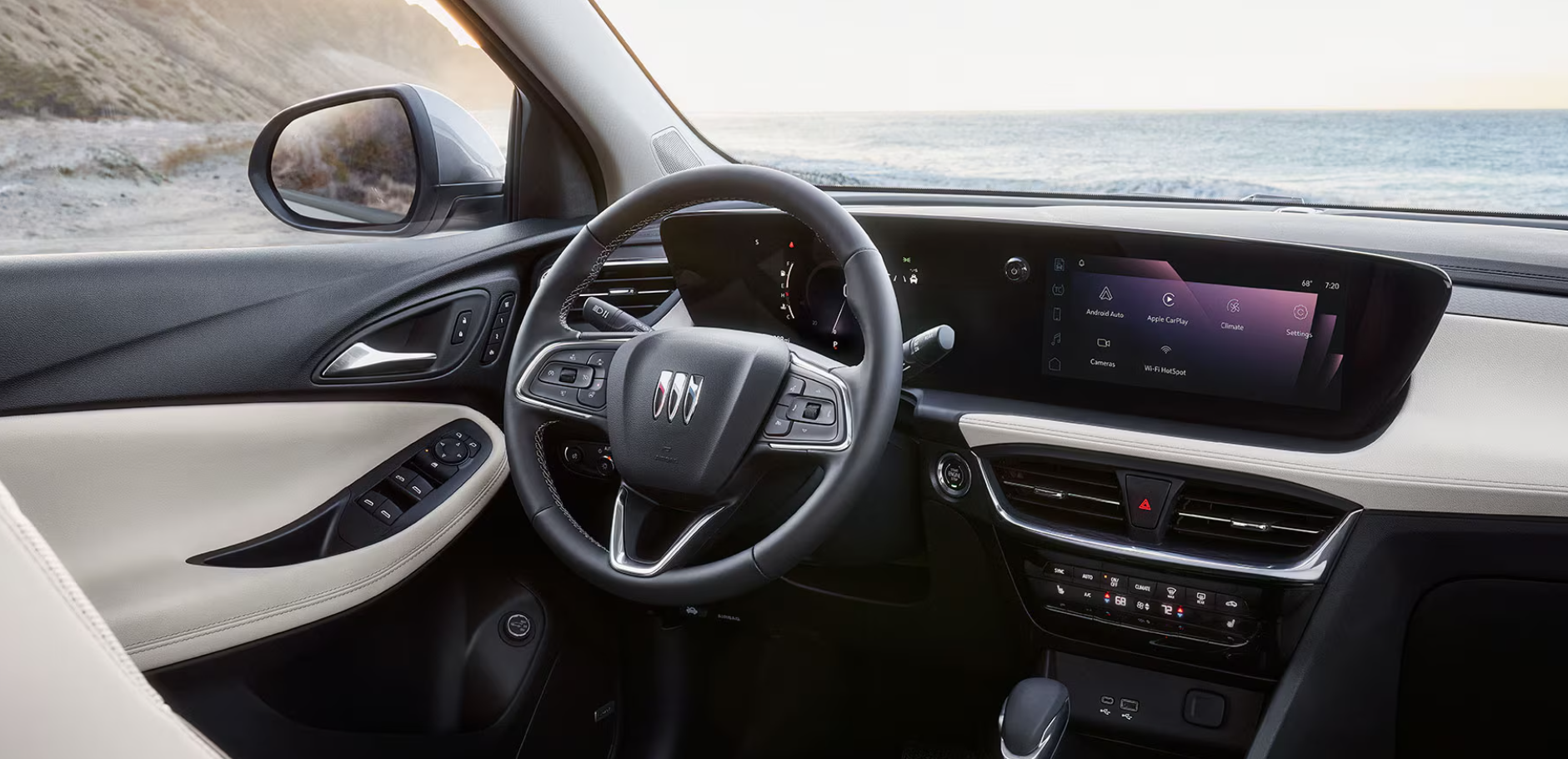 Interior of the 2026 Buick Encore GX with touchscreen display and two-tone dashboard.